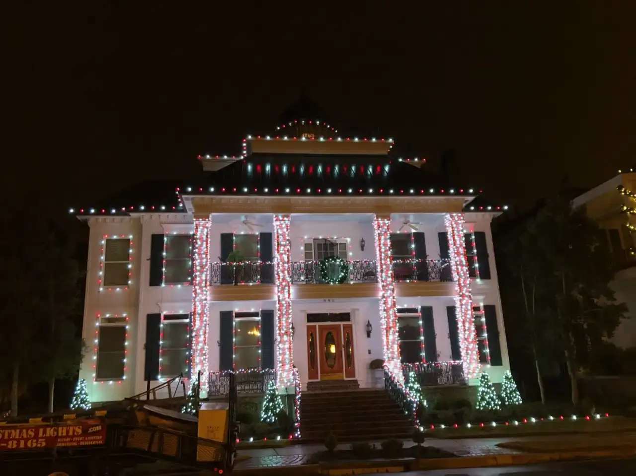 Home with wreaths and garland installed by Roper